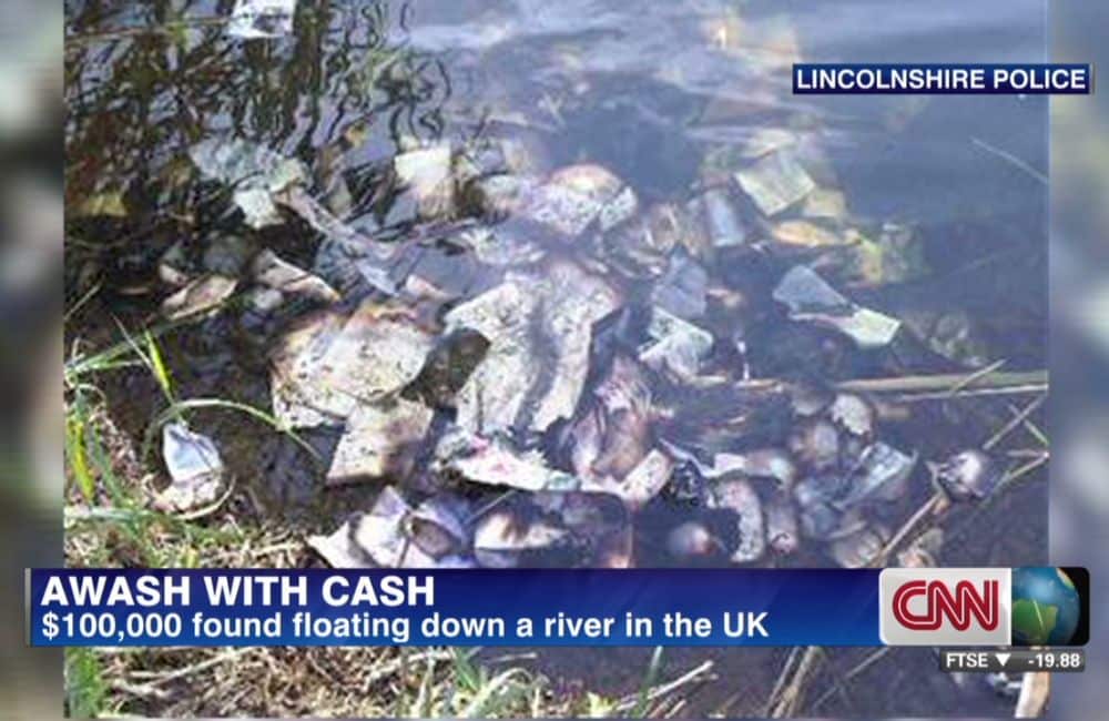 Man Walking His Dog Finds $100,000 Floating Down River